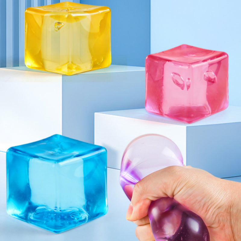 Transparent square fidget balls in pink, blue, and yellow with bubble textures