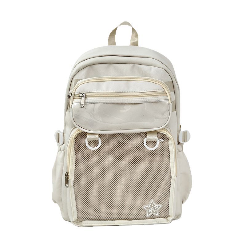 White large capacity nylon backpack with front zip pocket, mesh panel, and star badge