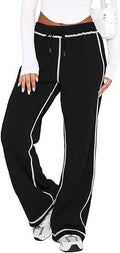 Black jogger sweatpants with drawstring, elastic waist, and white side stripe cuffs
