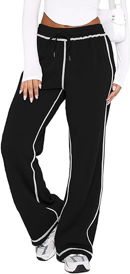 Black jogger sweatpants with drawstring, elastic waist, and white side stripe cuffs