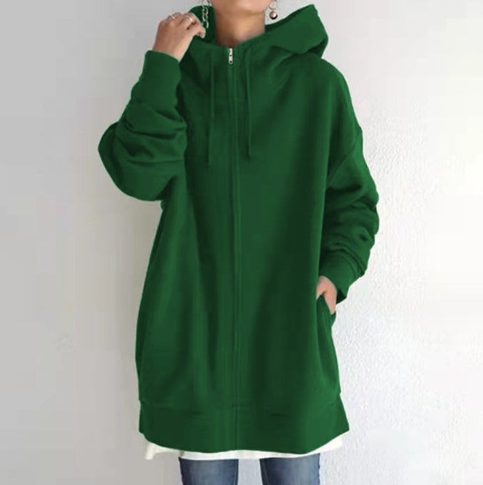 Women’s oversized green zip-up hooded coat with long sleeves and front zipper