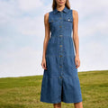 Blue denim maxi dress with high waist, sleeveless button front and side pockets
