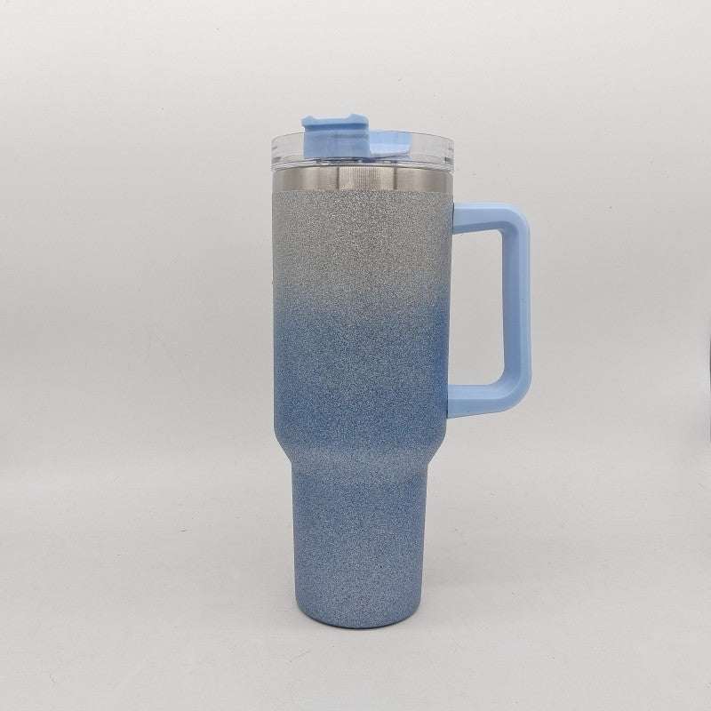 Large insulated stainless steel tumbler, blue-gray finish with clear lid and straw, with handle