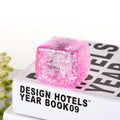 Pink glitter ice-cube slow-rebound squeeze toy, chunky translucent rectangular cube