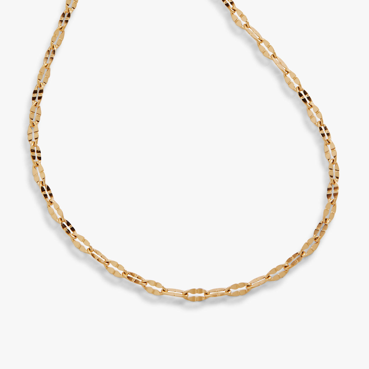 Gold multi-faceted chain anklet with repeating oval links