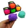 Purple cat-shaped stress relief venting ball, hand-held beside boxed set