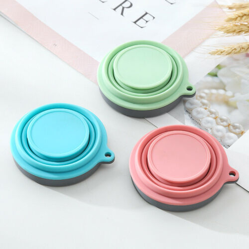 Collapsible silicone travel coffee cups in mint green, teal, and coral with gray lids