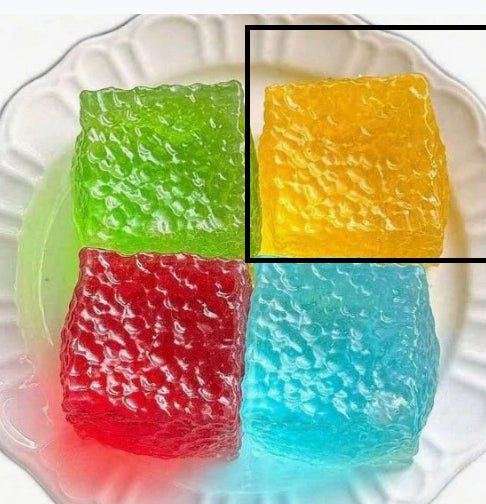 Green and yellow translucent squishy cubes highlighted; red and blue cubes shown.