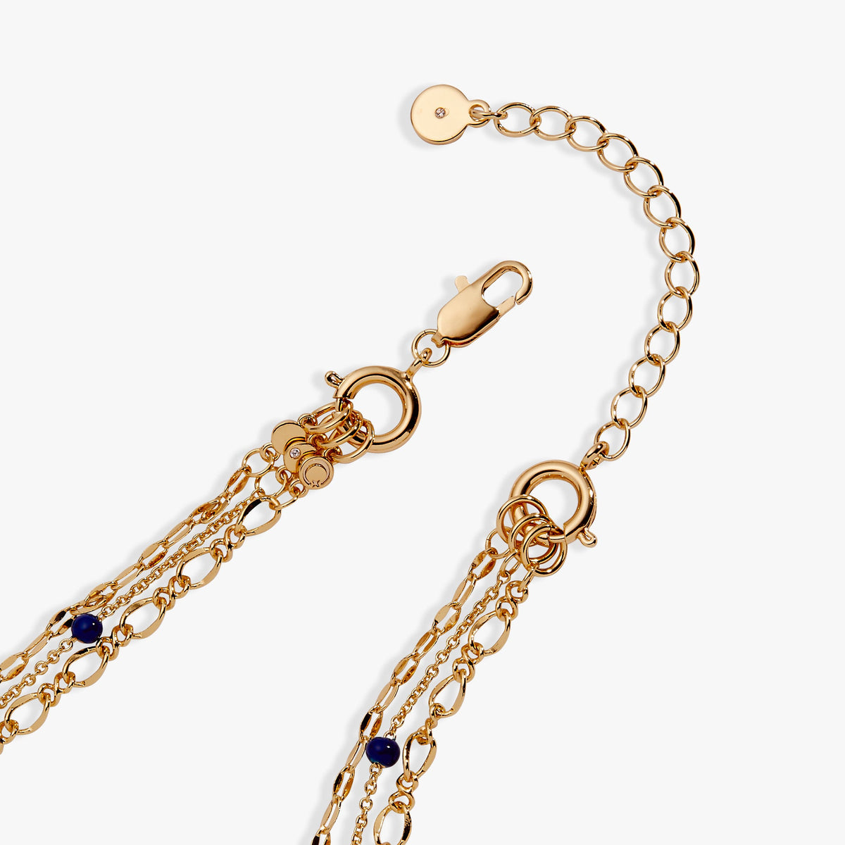Gold evil eye necklace chain detail with clasp and layered links