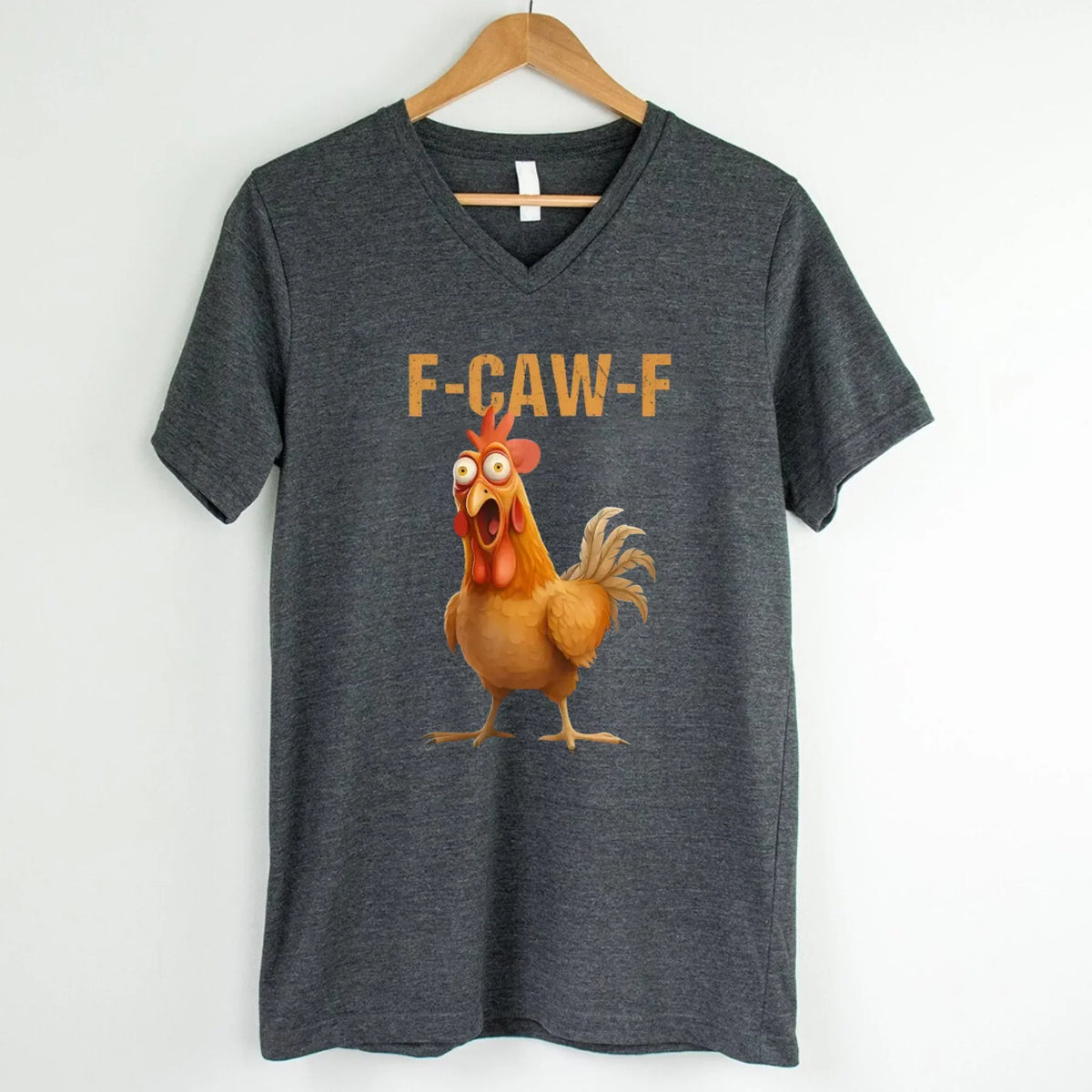 Dark heather grey v-neck T-shirt with rooster graphic and "F-CAW-F" text