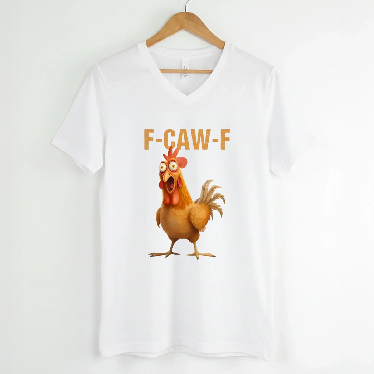White v-neck T-shirt with rooster graphic and "F-CAW-F" text