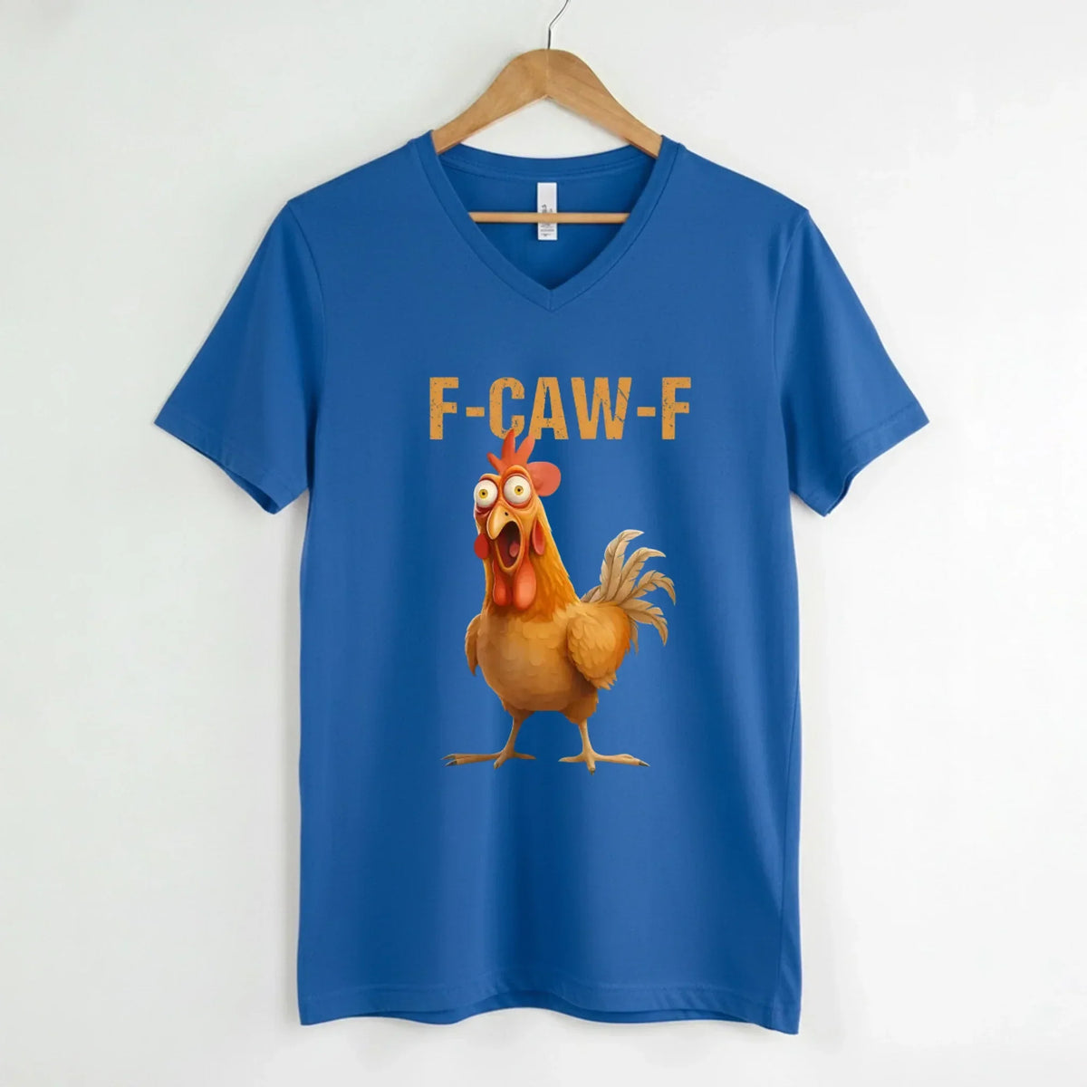 Royal blue v-neck T-shirt with rooster graphic and "F-CAW-F" text