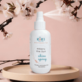 White KUKI hair shine spray bottle with pump, HIKARU the Sun label