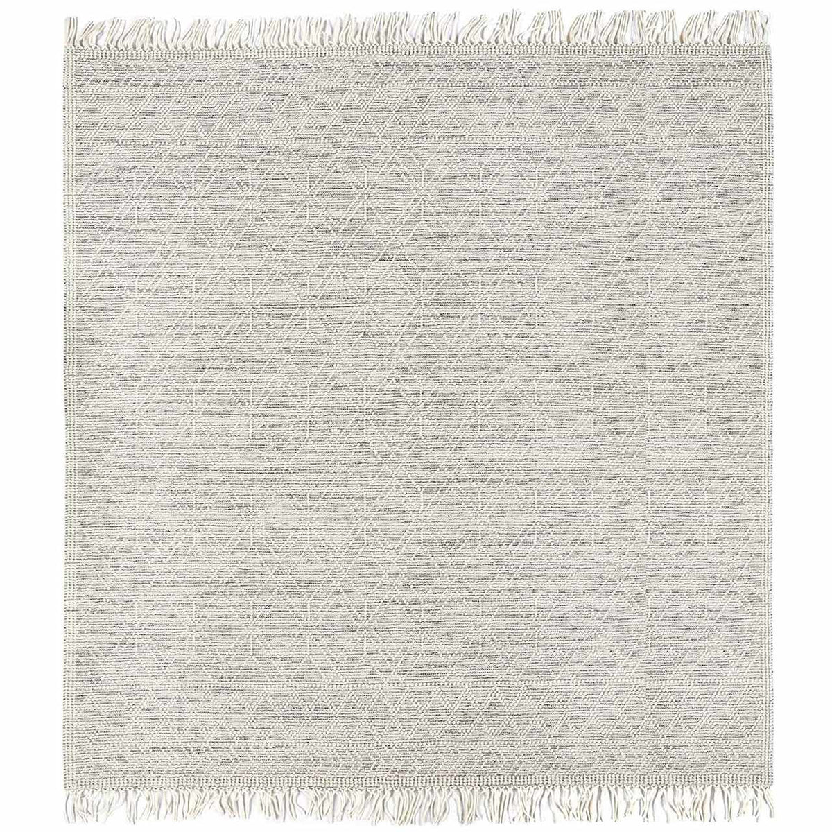 Handwoven gray and white area rug with dense geometric diamond pattern and fringed border