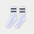 LA Gear white crew socks with black top stripes and logo
