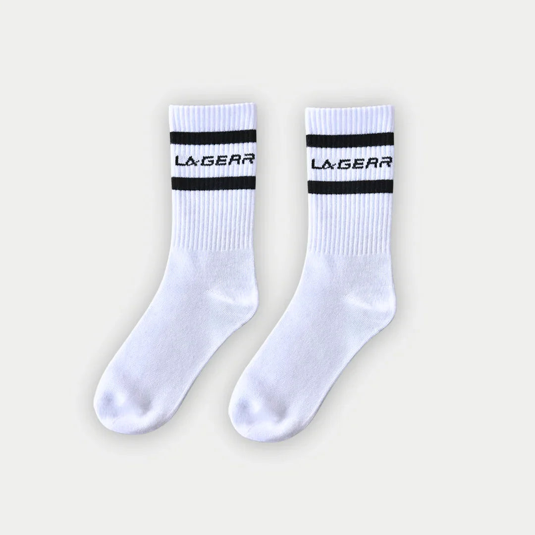 LA Gear white crew socks with black top stripes and logo