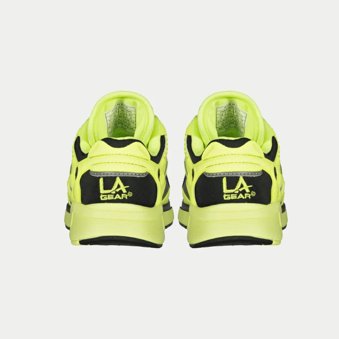 Kids neon yellow and black low-top light-up sneakers, heel view with pull tab