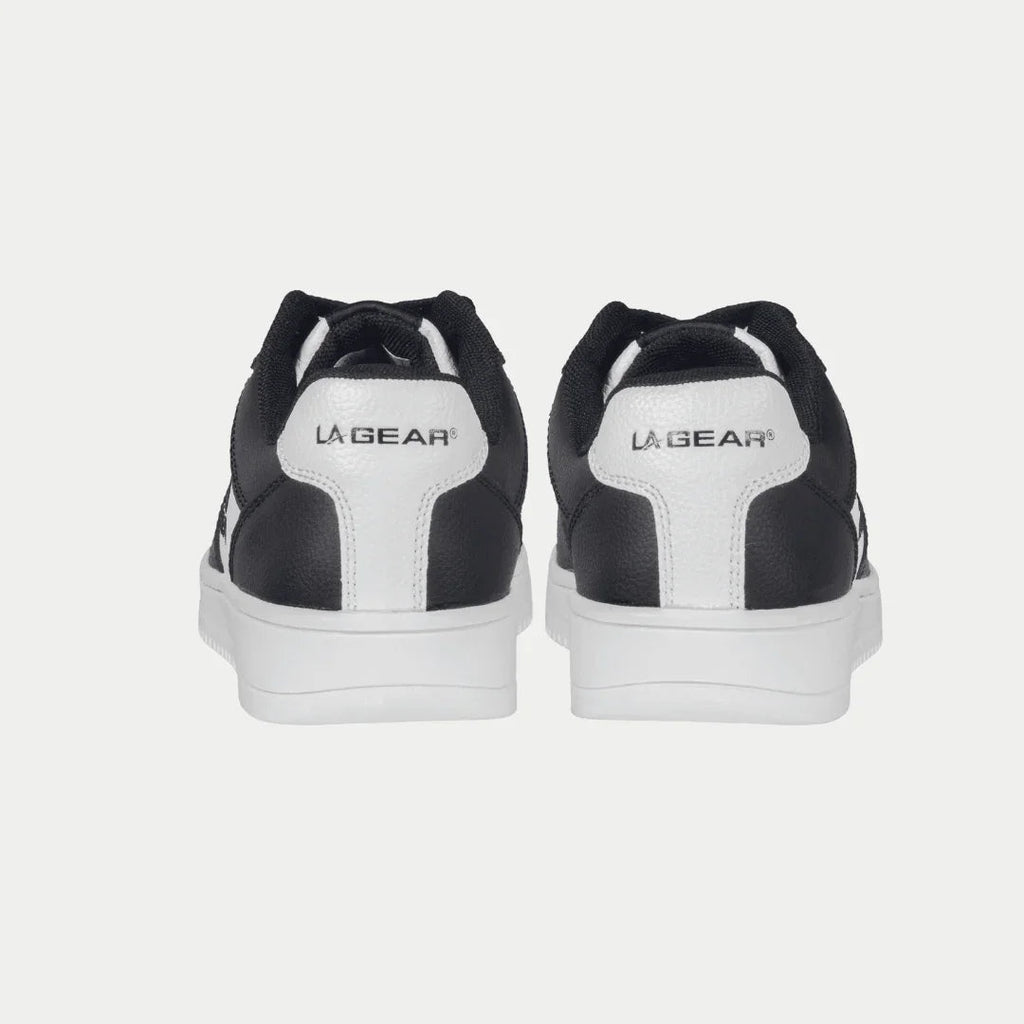Kids' black and white low-top sneakers with LA Gear logo on the heel