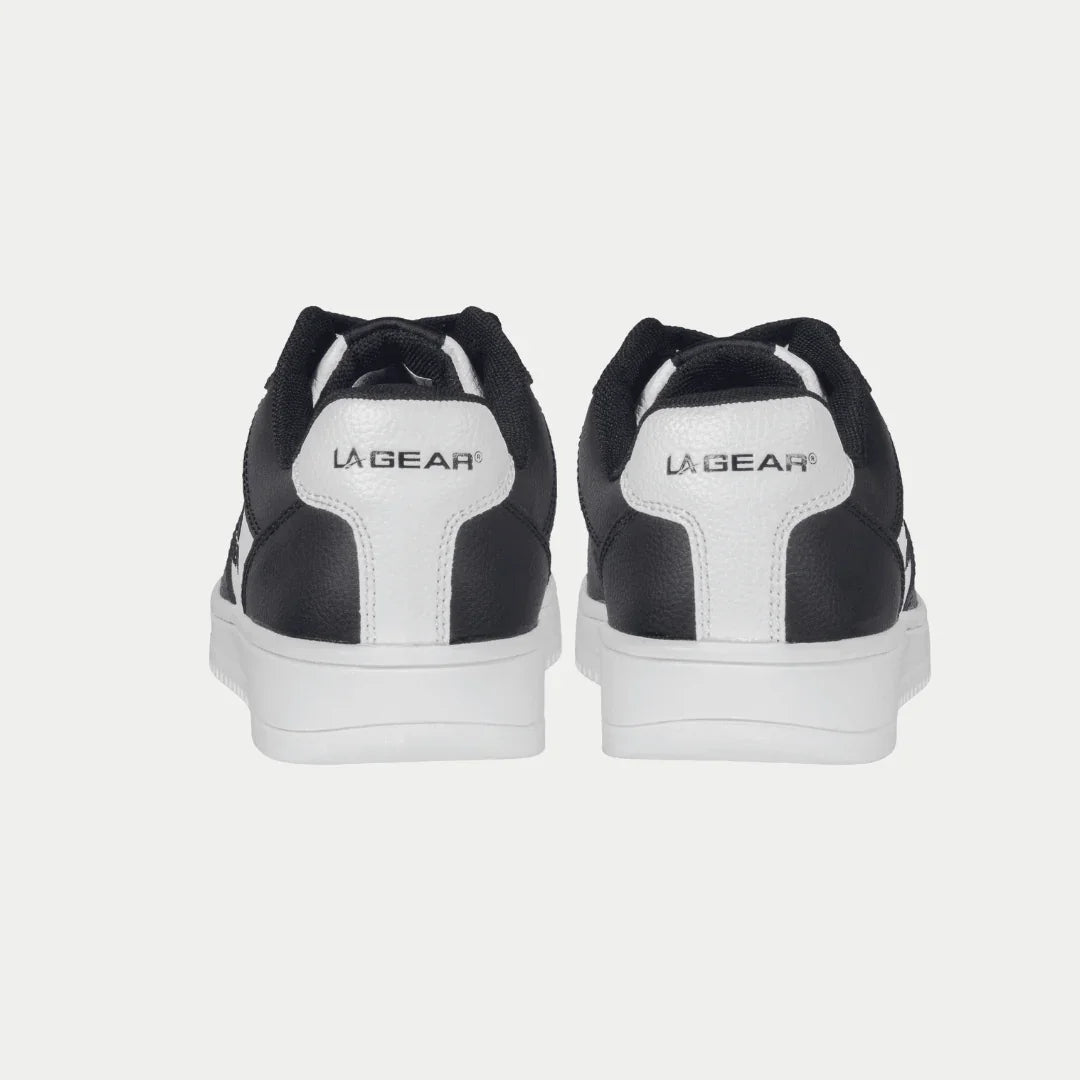 Kids' black and white low-top sneakers with LA Gear logo on the heel