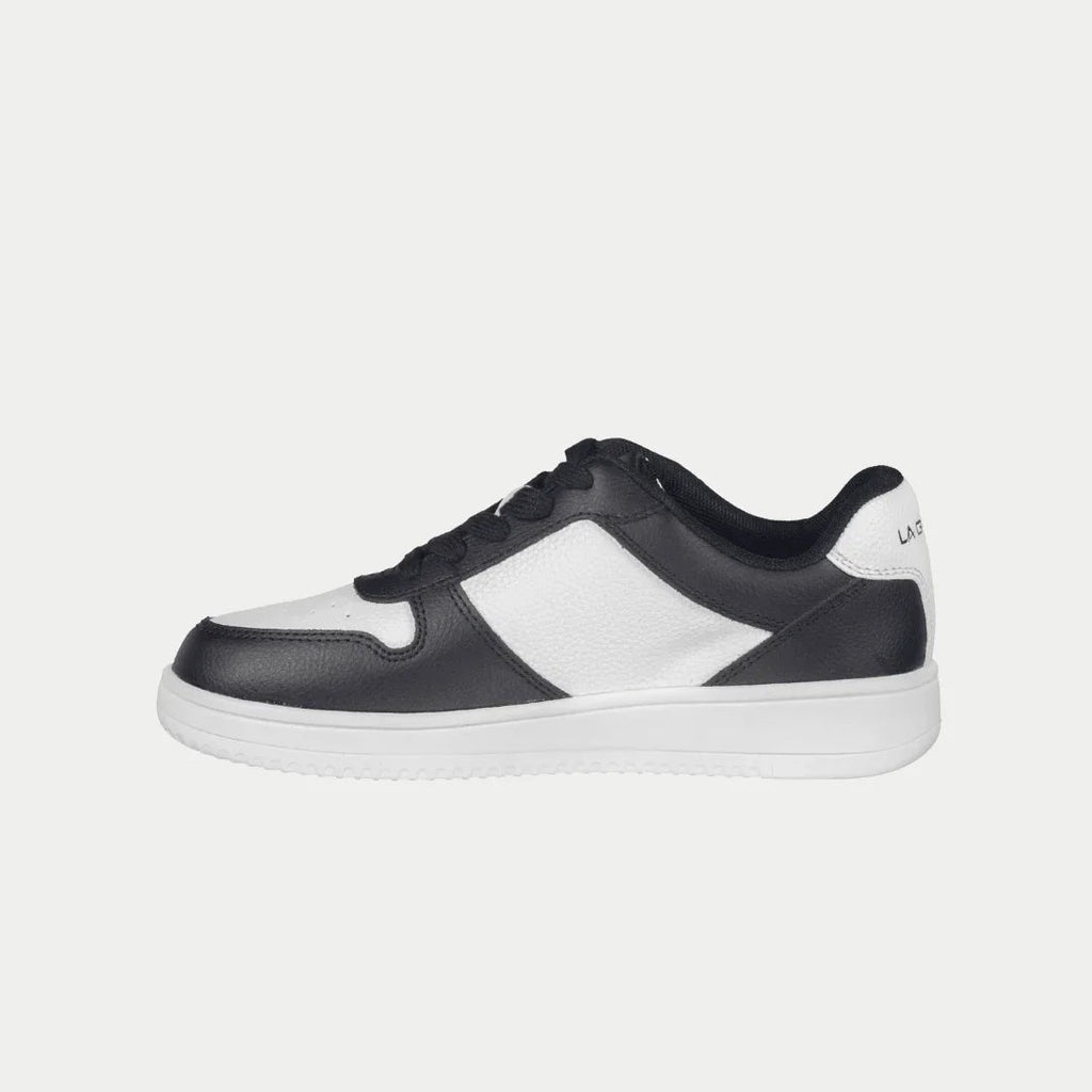 Kids' black and white low-top sneakers with white side panel and black toe