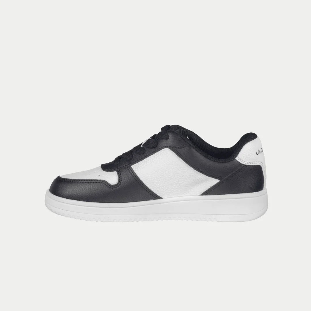 Kids' black and white low-top sneakers with white side panel and black toe