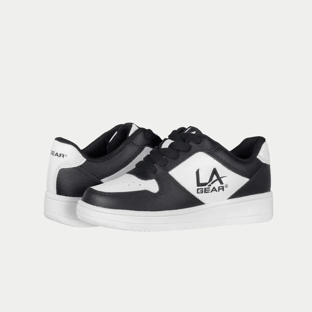Kids' black and white low-top sneakers, side view with LA Gear emblem