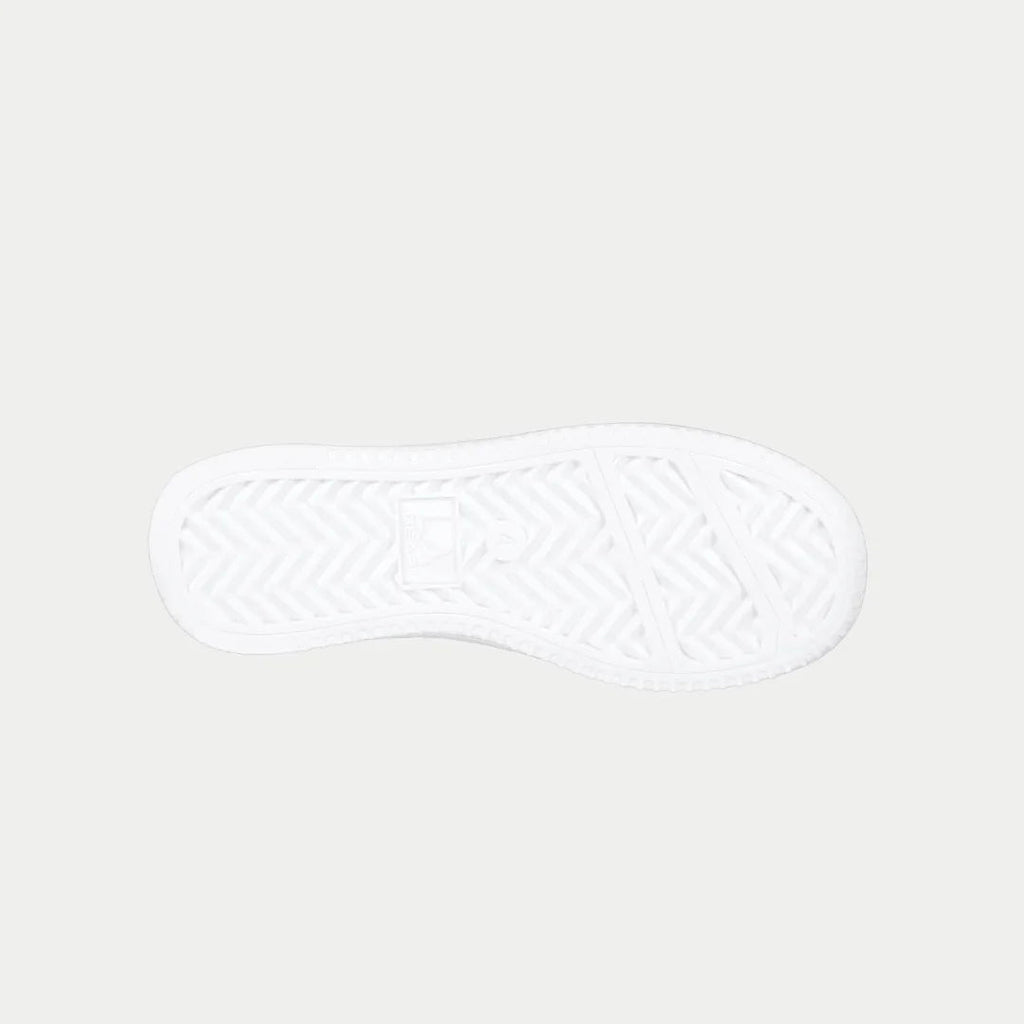 Kids' black and white low-top sneaker outsole with textured tread