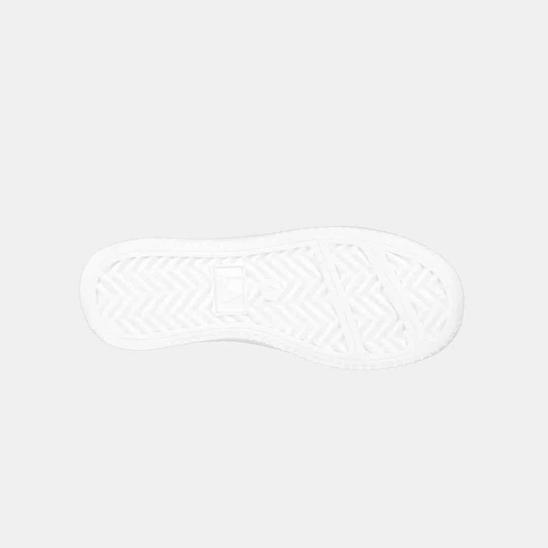 Kids' black and white low-top sneaker outsole with textured tread