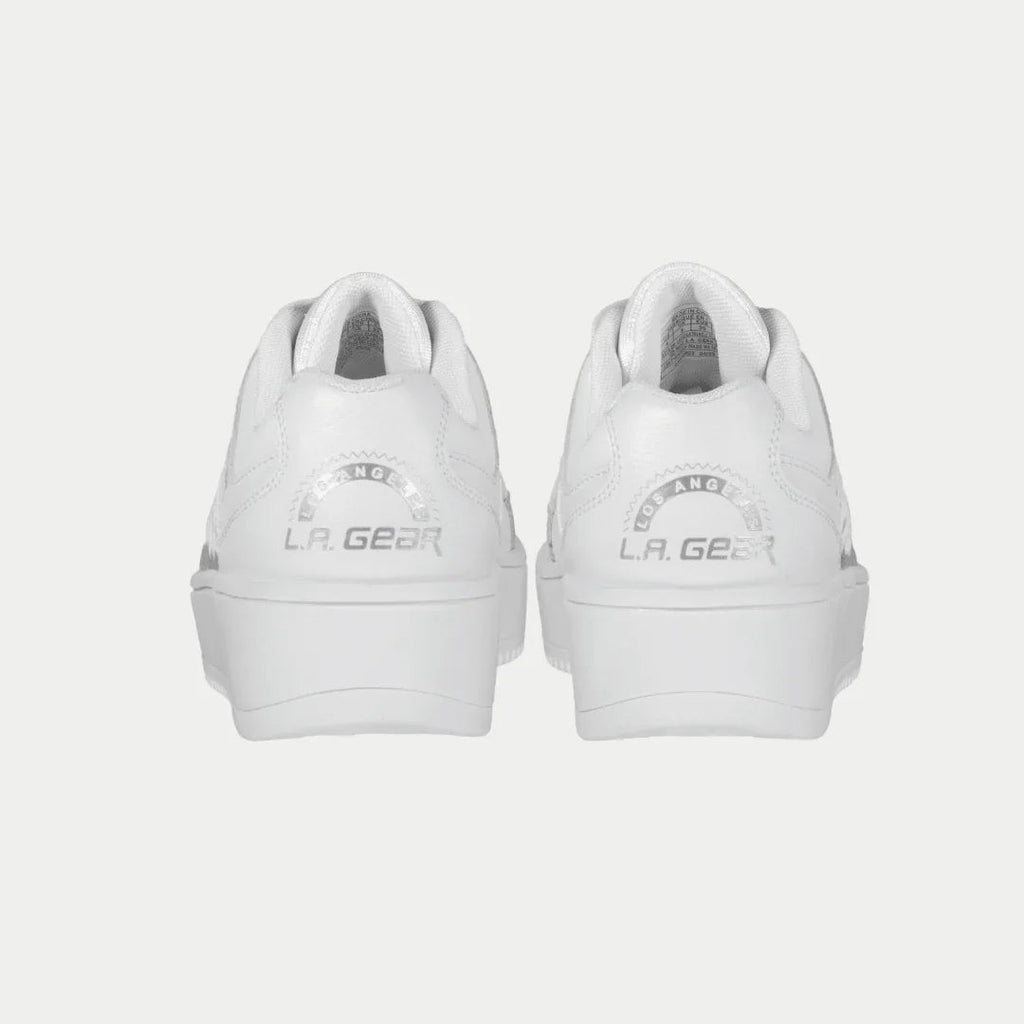 Kids white lowtop sneakers with heel logo and padded collar