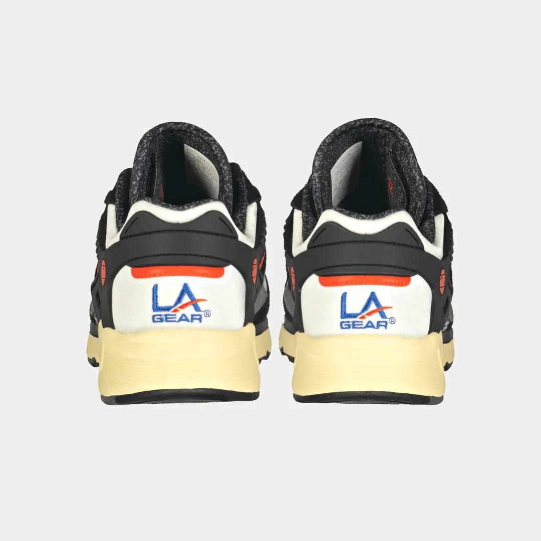 Back view of men's light-up lowtop sneakers, black heels with light-up orange stripe and cream sole