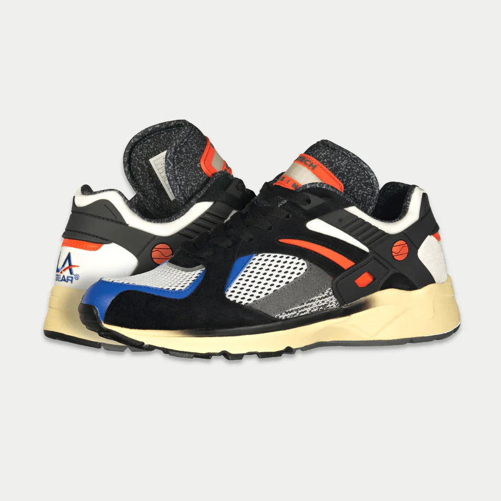 Men's light-up lowtop sneakers, black upper with orange stripes, blue/white mesh panels, cream sole
