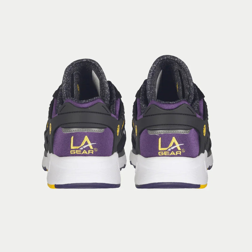 Back view of men's lowtop sneakers in black with purple LA Gear heel branding