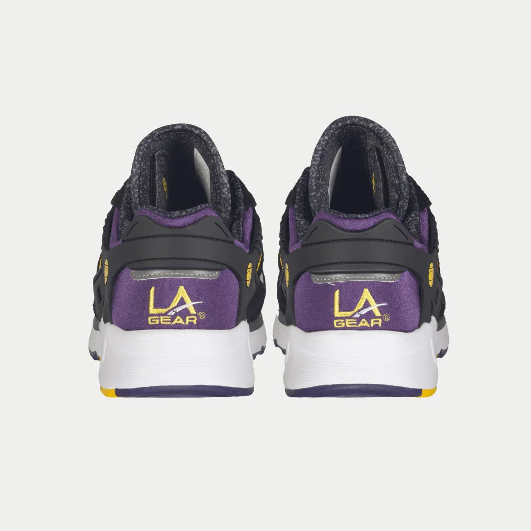 Back view of men's lowtop sneakers in black with purple LA Gear heel branding
