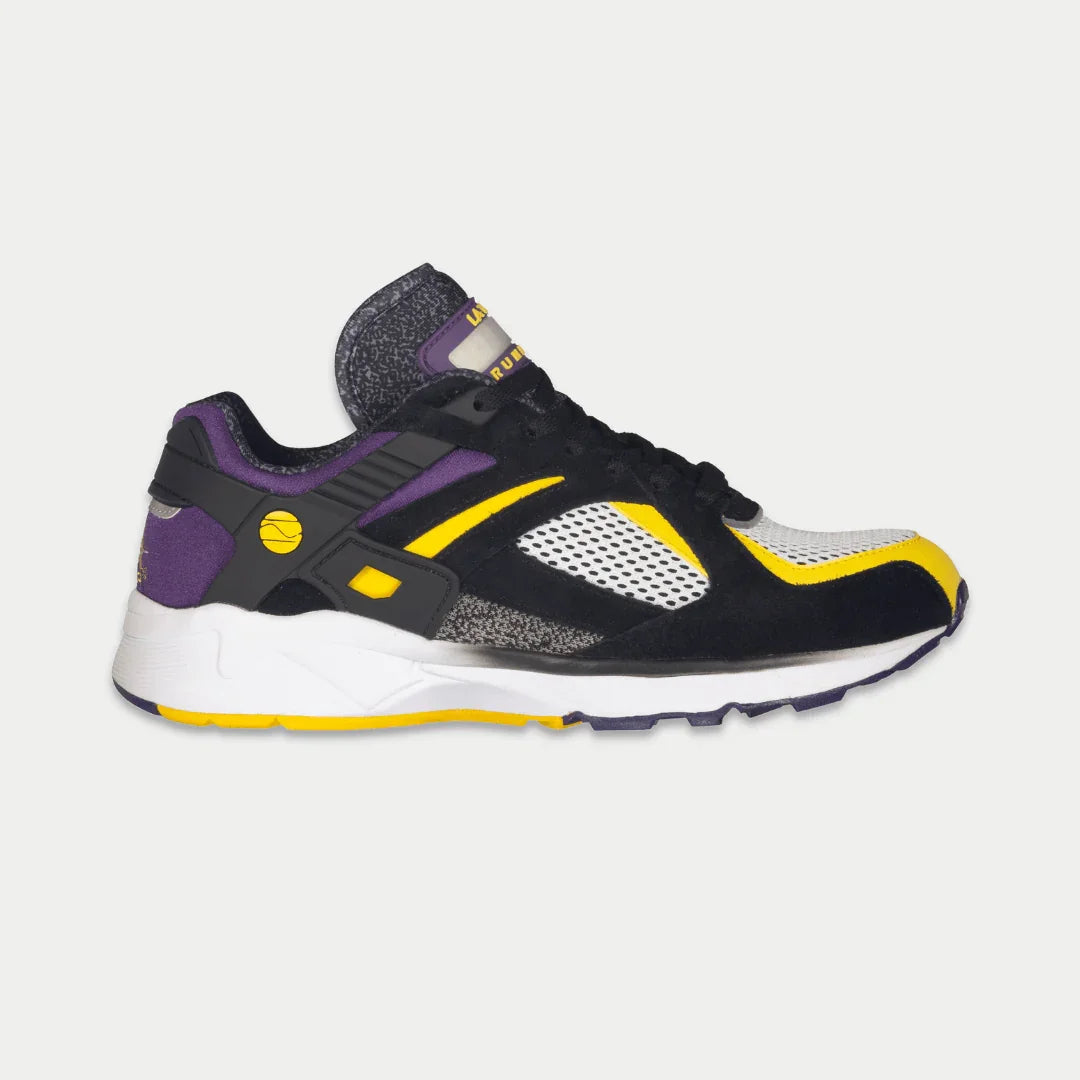 Men's light-up lowtop sneaker in black with purple and yellow accents, lace-up front