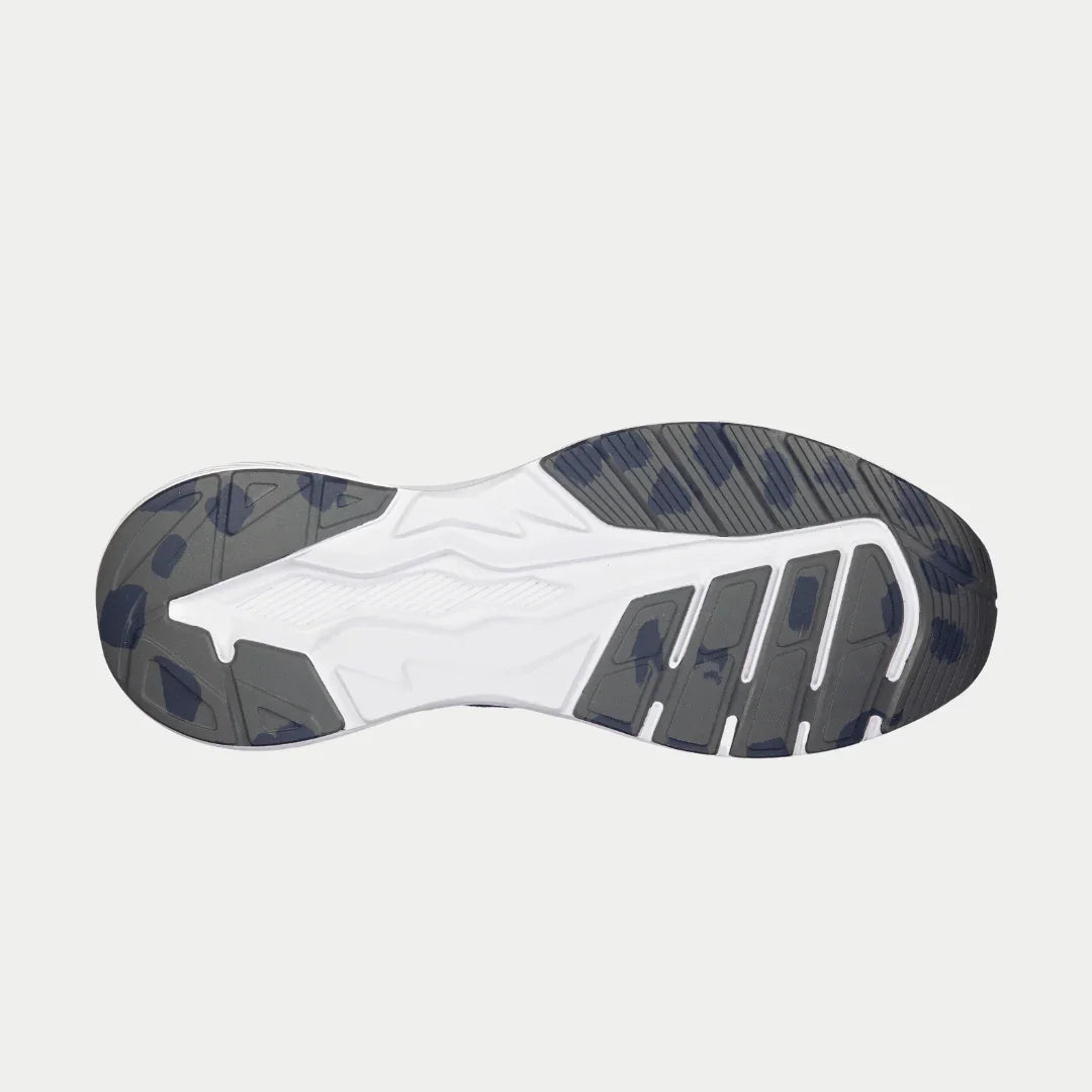 Outsole of navy blue lowtop sneakers with tread pattern
