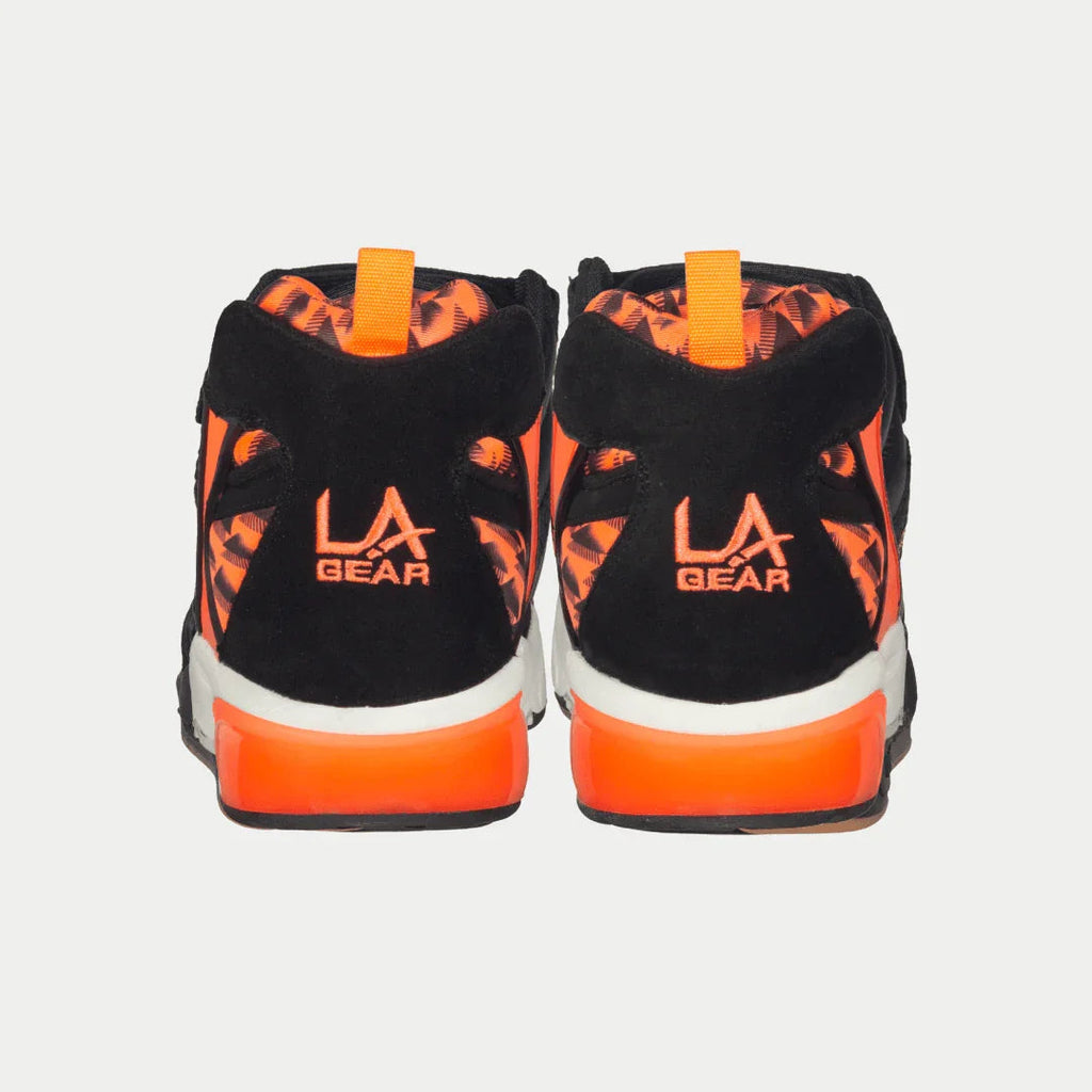 Men's black mid-top light-up sneakers, LA Gear logo on heel, neon orange back