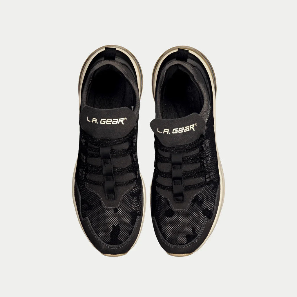 Pair of black mesh lowtop sneakers with L.A. Gear logo on tongue