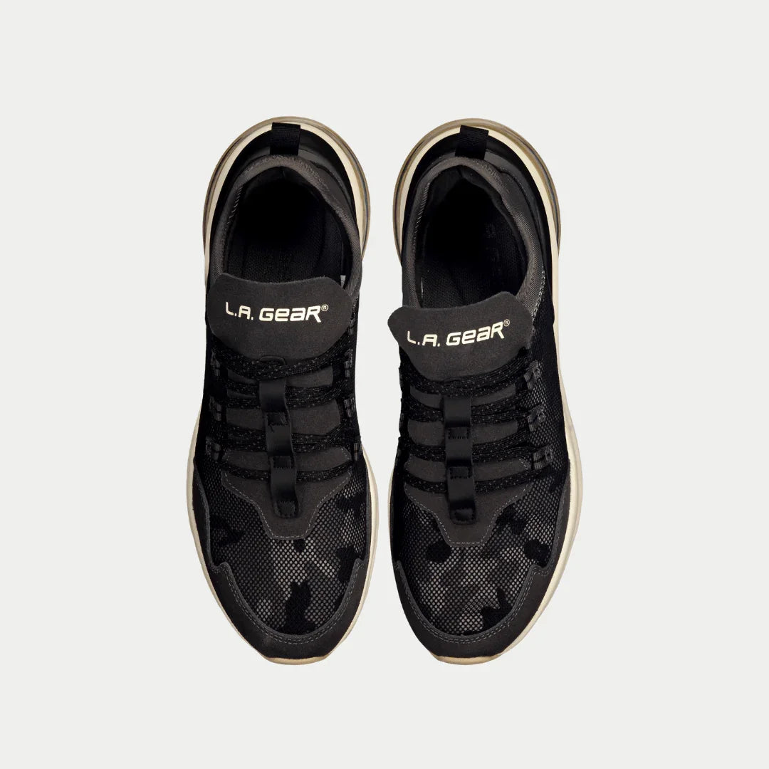 Pair of black mesh lowtop sneakers with L.A. Gear logo on tongue