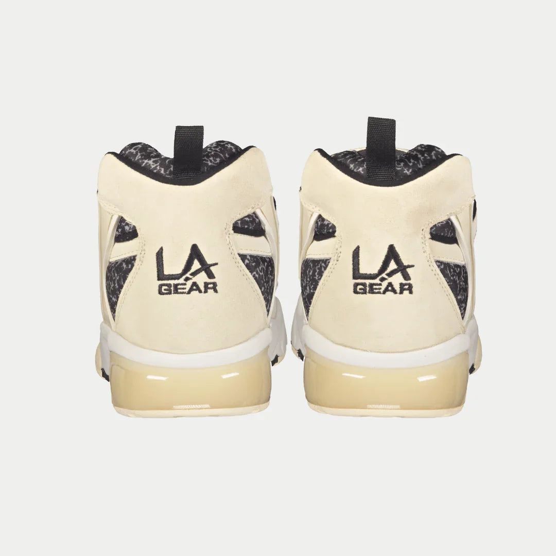 Men's off-white sneaker heels with black padded collar and 'LA GEAR' logo
