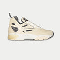 Men's off-white and black mid-top sneakers with white laces and black side trim