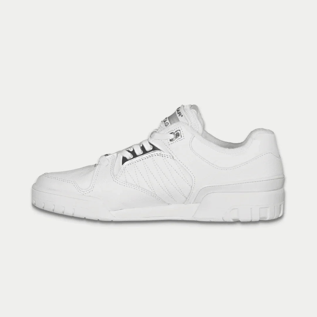 White low-top sneaker, front view, with perforated toe panel and lace-up