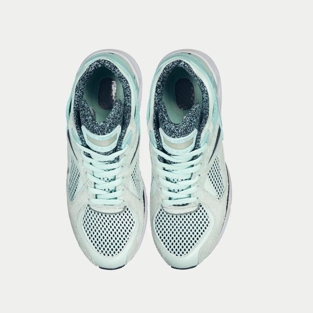 Mint lowtop sneaker pair, front view showing perforated panels and lace-up closure