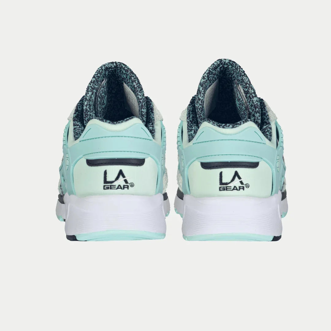 Mint lowtop sneaker heel view with LA Gear logo on back and cushioned collar