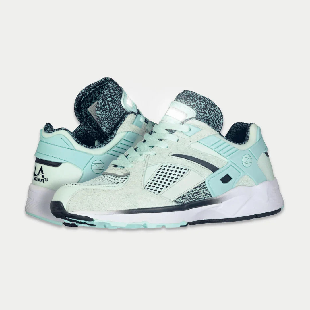Mint and black lowtop sneaker, angled side view with speckled lining and midsole