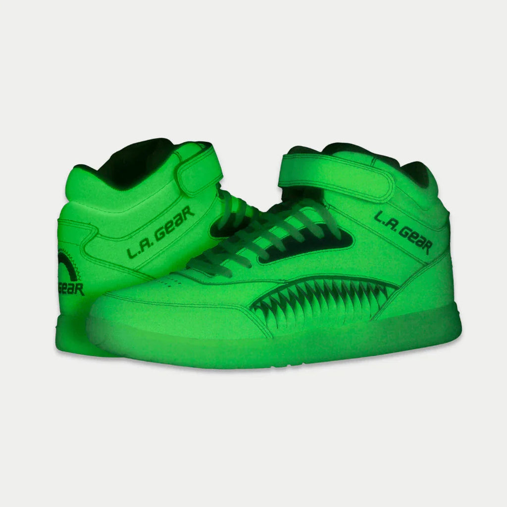 Green high-top sneakers with LA Gear logo, lace-up, and ridged side panel