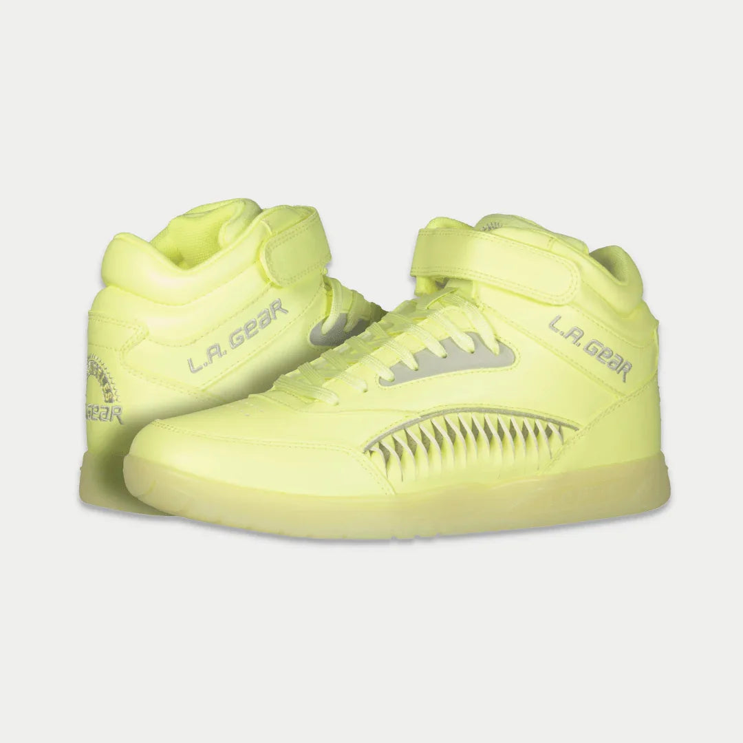 Neon yellow lace-up high-top sneakers with LA Gear branding and ridged swoosh panel
