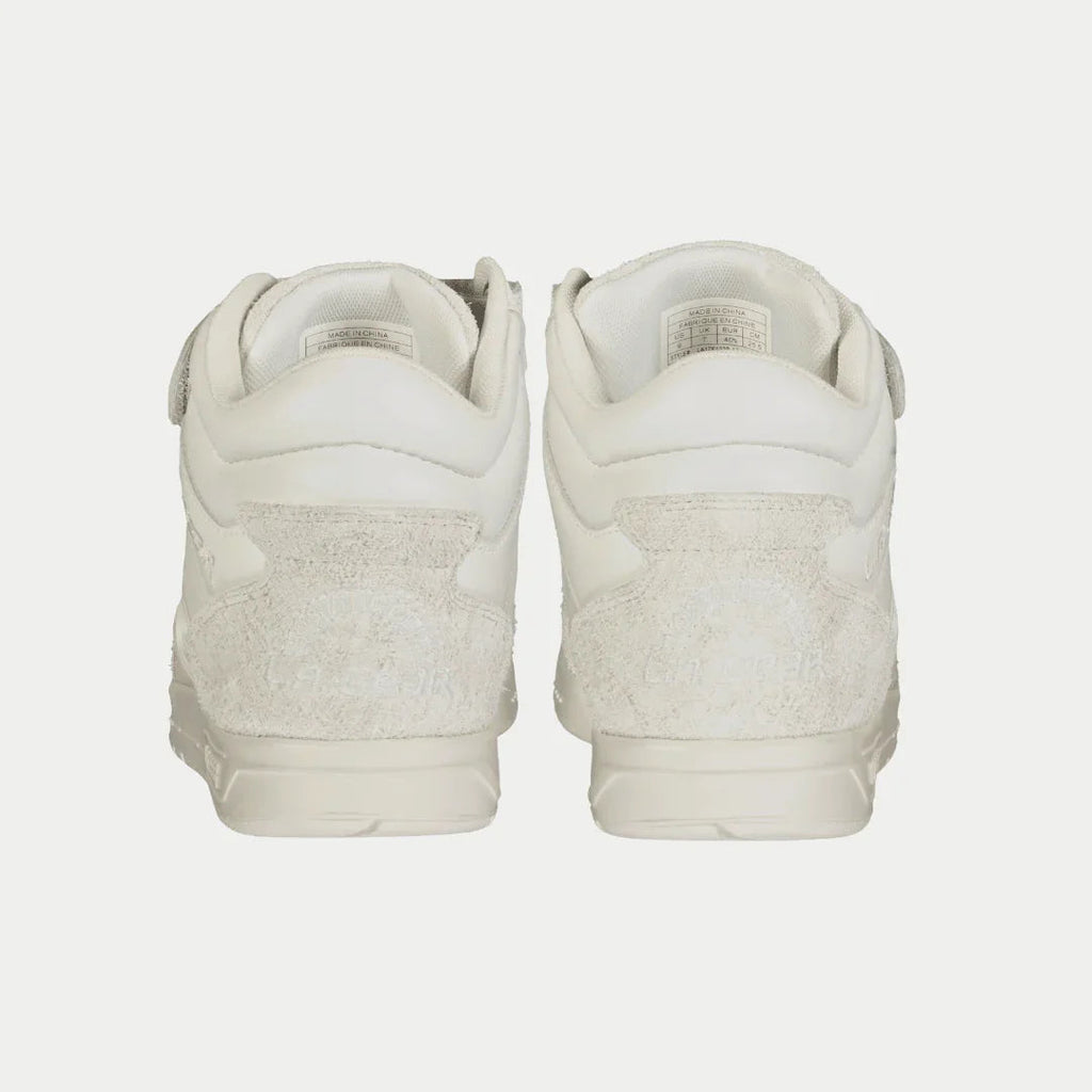Women’s white retro high-top sneakers, heel view with cushioned back tab
