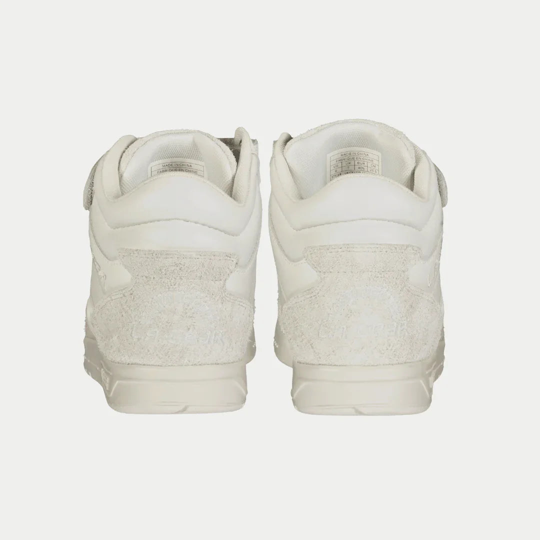 Women’s white retro high-top sneakers, heel view with cushioned back tab