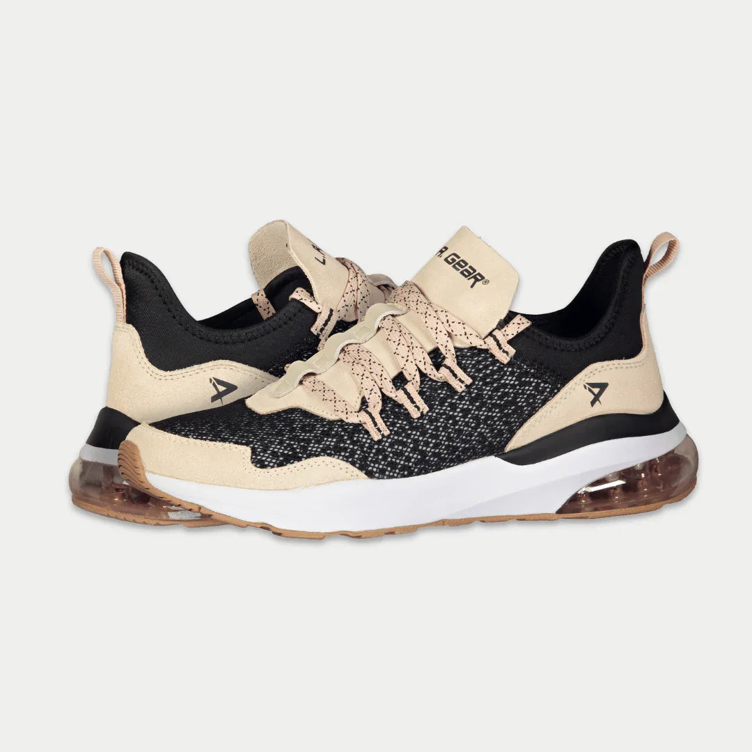 Women’s low-top running sneaker, side view, black knit with tan panels and pink laces
