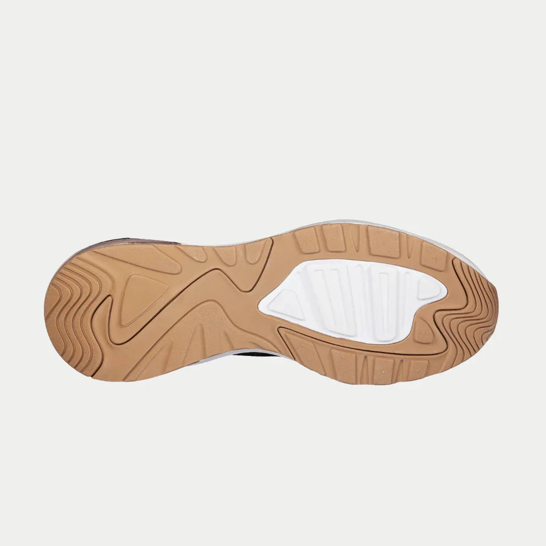 Women’s running sneaker outsole view, tan rubber with white traction sections